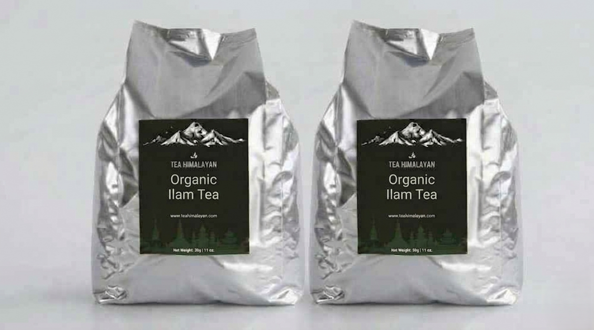 Two silver foil bags of Tea Himalayan Organic Ilam Tea with black label, set against a plain light gray background.