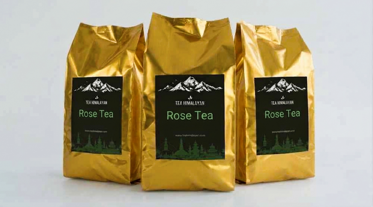 Three gold foil bags of Tea Himalayan Rose Tea arranged in a row against a light gray background.