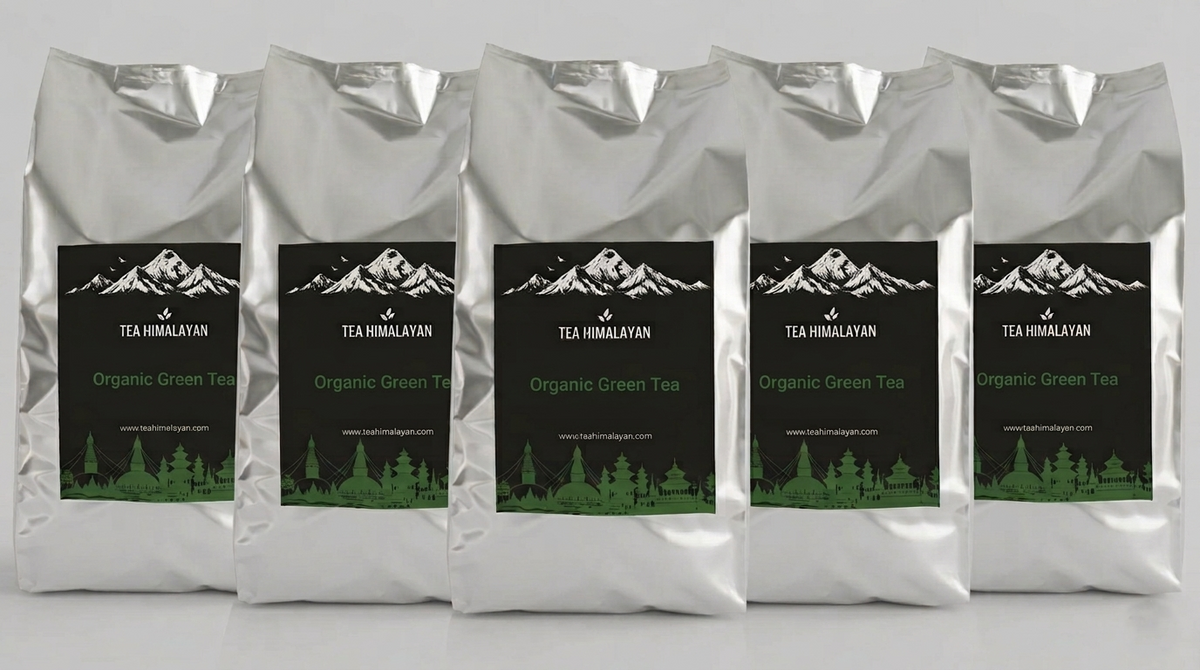 Five silver bags of Tea Himalayan Organic Green Tea arranged in a row against a light gray background.