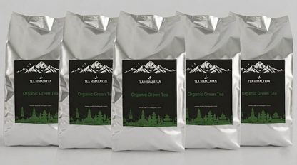 Five silver bags of Tea Himalayan Organic Green Tea arranged in a row against a light gray background.