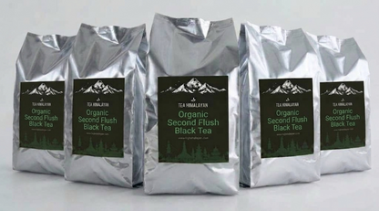Five silver bags of Tea Himalayan Organic Autumn Flush Black Tea arranged in a row against a light gray background.