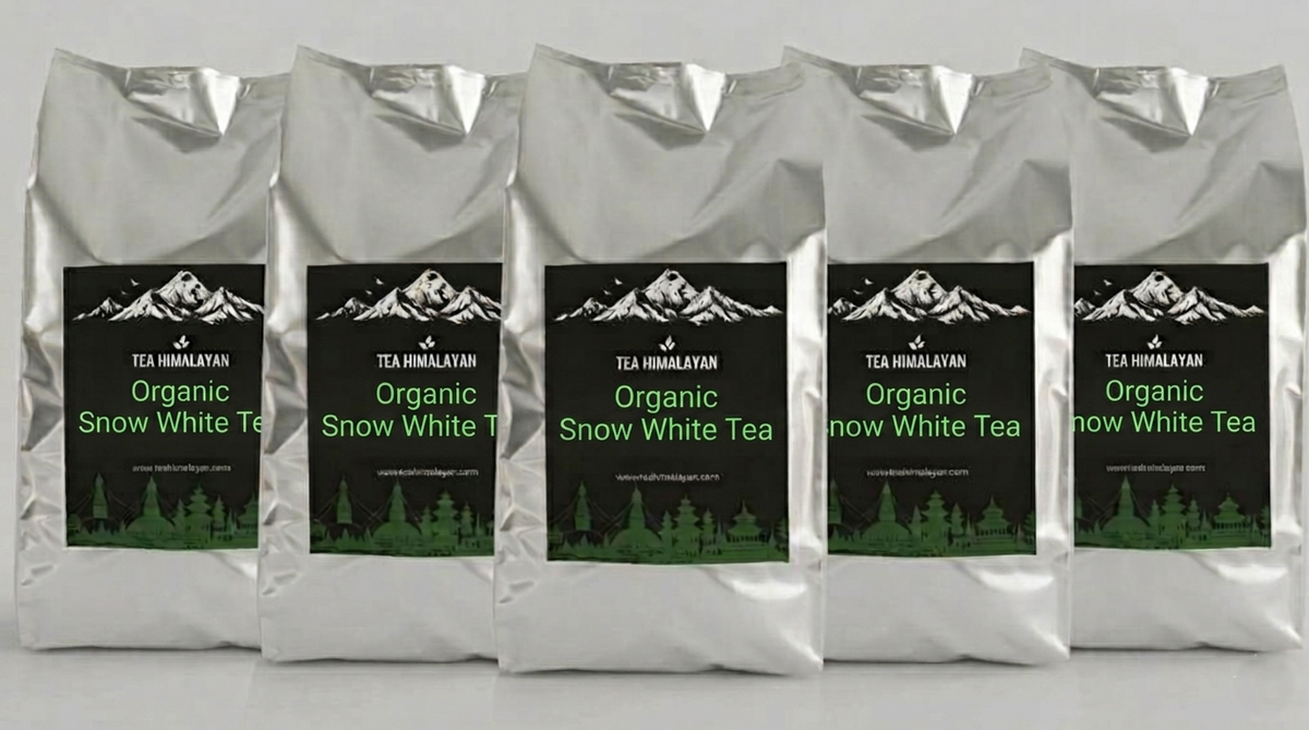 Five silver bags of Tea Himalayan Organic Snow White Tea arranged in a row against a light gray background.