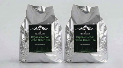 Two silver foil bags of Tea Himalayan Organic Nepali Secha Green Tea, displayed side-by-side against a light gray background.