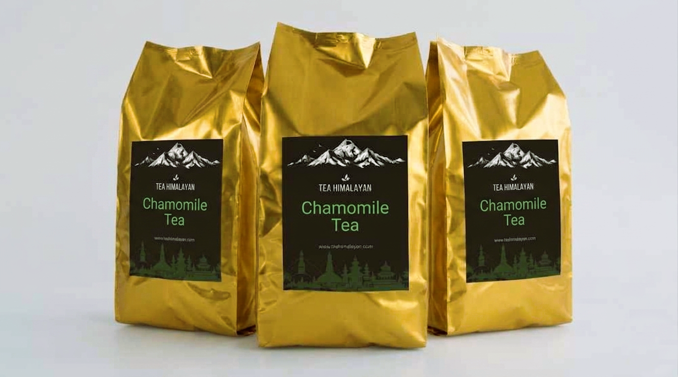 Three shiny gold bags of Tea Himalayan Chamomile Tea arranged side by side on a light gray background.