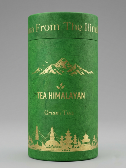A green cylindrical tea tin with gold foil mountain, leaf, and architectural illustrations, labeled 'TEA HIMALAYAN' and 'Green Tea' on a neutral gray background.