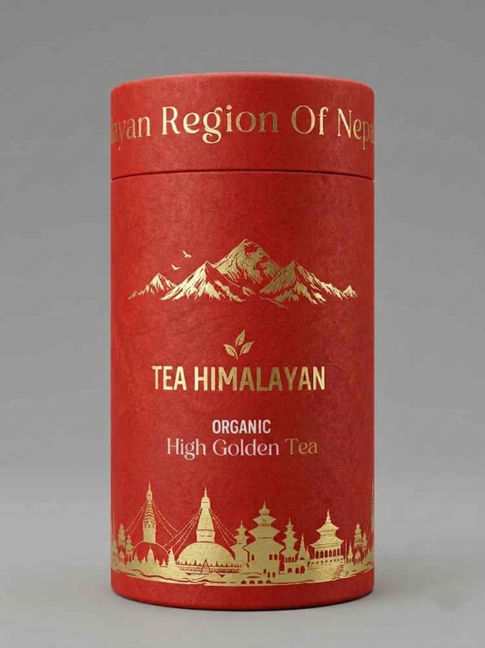 A cylindrical red tea tin with gold foil text reading 'TEA HIMALAYAN' and 'ORGANIC High Golden Tea,' plus gold mountain and architectural illustrations, photographed on a neutral gray background.